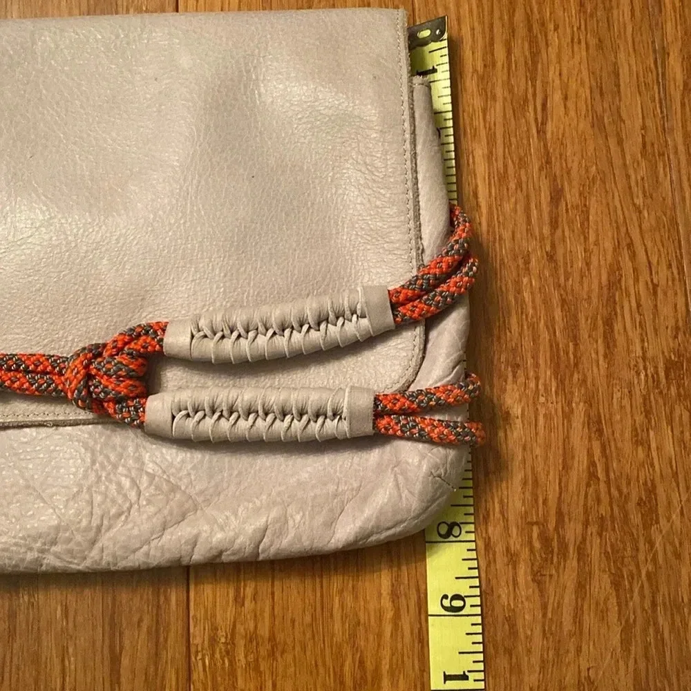 L.A.M.B. By Gwen Stefani gray Leahter clutch -orange rope detail